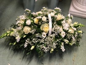 White funeral basket
